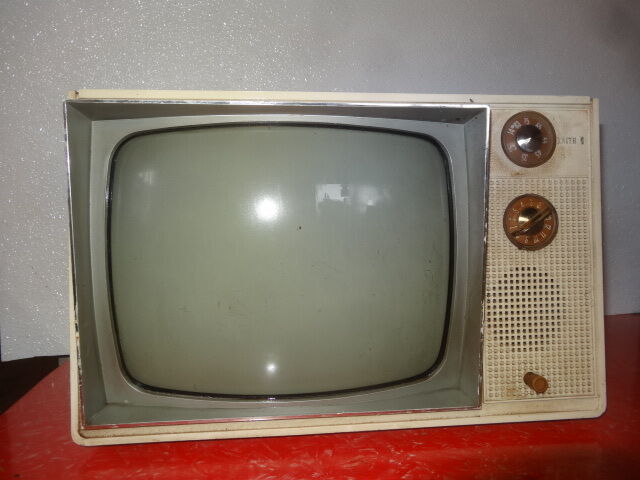 Old 1960s TV set, white dingy case.