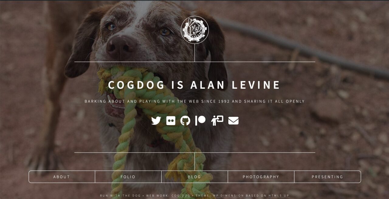 Cogdog is Alan Levine text with a row of social media link icons , and 5 boxes below-- About, Folio, Blog, Photography, Presenting, all superimposed on  a photo of a playful dog pulling  a rope