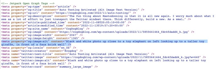 Source code of web page for my post showing opengraph tags, highlighting to show the one of interest -- meta property="og:image:alt" content="Black and white photo up close to a toy elephant on left looking up to a taller toy giraffe, in front of a faux brick wall"