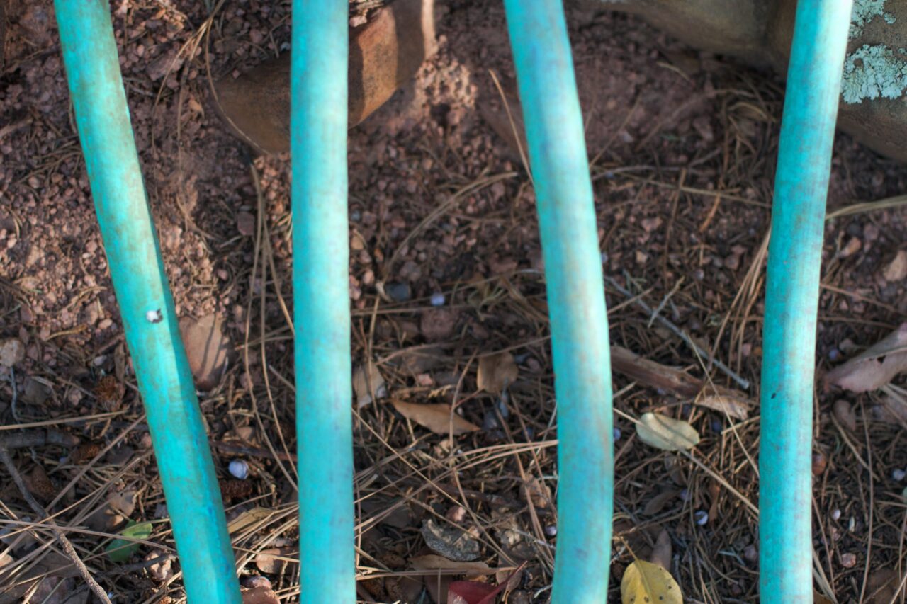 Four green hoses.