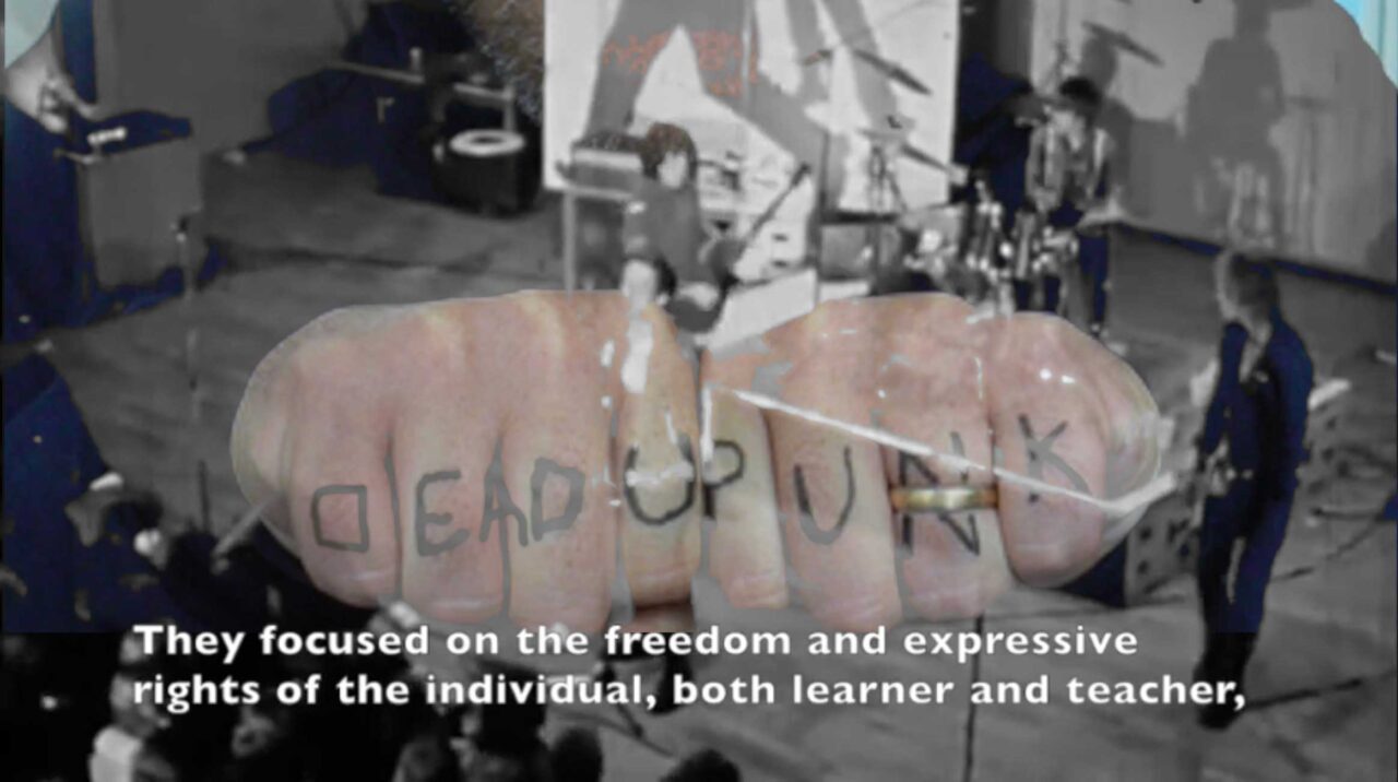 Merged image, one two hands pushed together with letters written across knuckles "deadpunk" atop a faded black and white image of a punk rock band on stage. Text at the bottom reads They focused on the freedom and expressive rights of the individual, both learner and teacher,