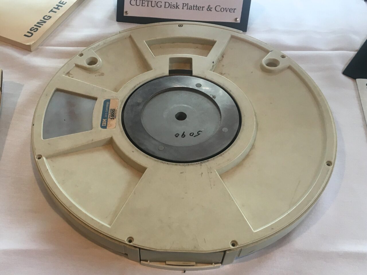 An old computer data tape loaded on a machine that once read their data.